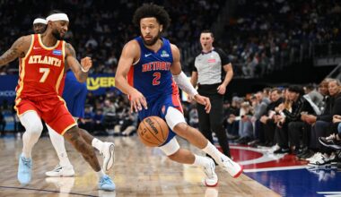 Detroit Pistons guard Cade Cunningham (2) drives past Atlanta Hawks guard Nickeil Alexander-Walker (7) in the first quarter at Little Caesars Arena.