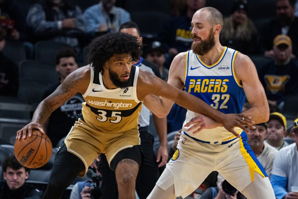 Washington Wizards forward Marvin Bagley III (35) dribbles the ball while Indiana Pacers center Jay Huff (32) defends in the first half at Gainbridge Fieldhouse.