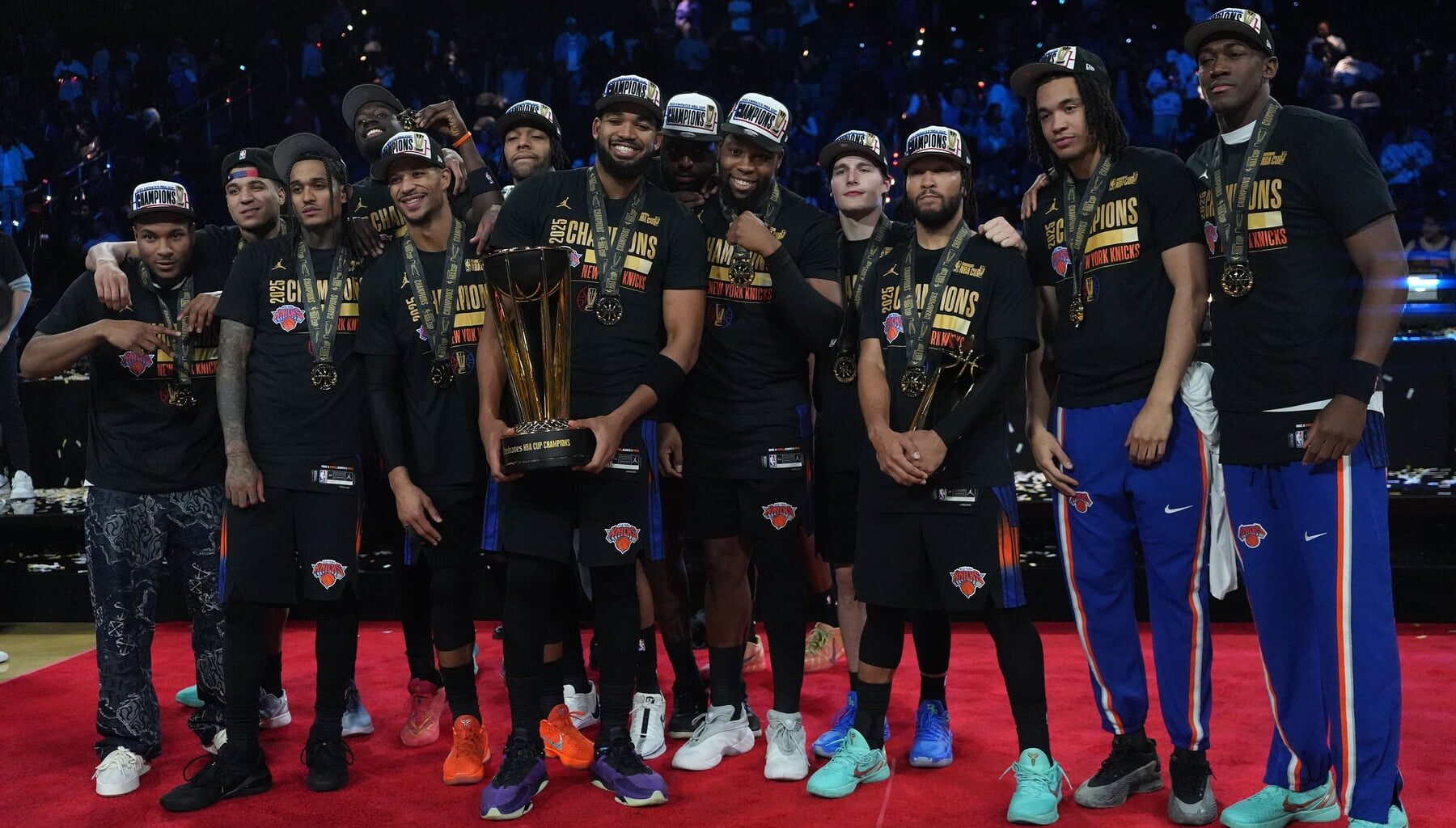 The New York Knicks pose for a photograph after winning the Emirates NBA Cup Final at T-Mobile Arena.