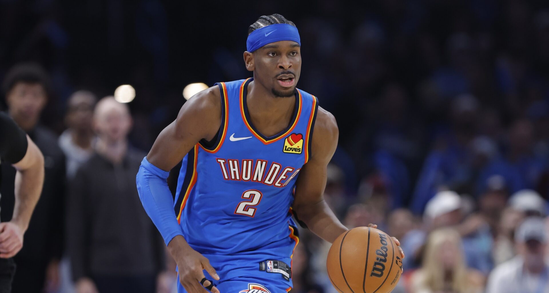 Thunder star Shai Gilgeous-Alexander brings the ball up the floor against the Grizzlies during the 2025-26 NBA season.
