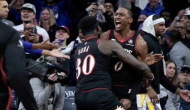 Sixers Tyrese Maxey is lifted up by teammate Adem Bona after the Sixers won the Golden State Warriors at Philadelphia 76ers NBA game at Xfinity Mobile Arena in Philadelphia on Thursday, Dec. 4, 2025.