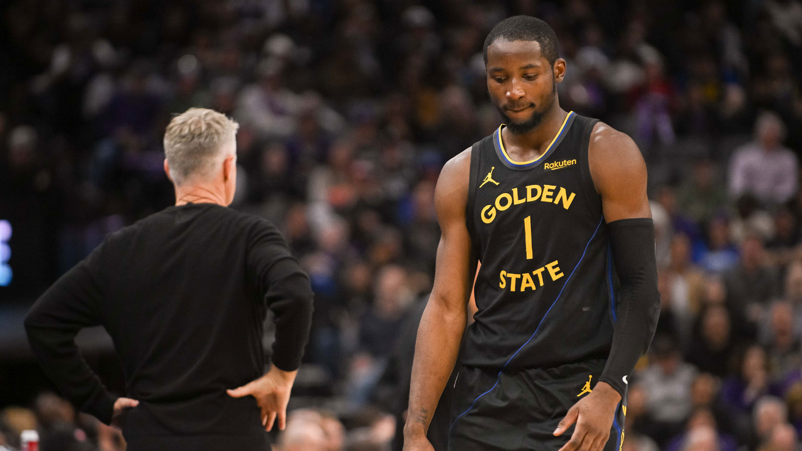 Golden State Warriors forward Jonathan Kuminga (1) walks off the court after being removed from the game during the fourth quarter of the game against the Sacramento Kings at Golden 1 Center.