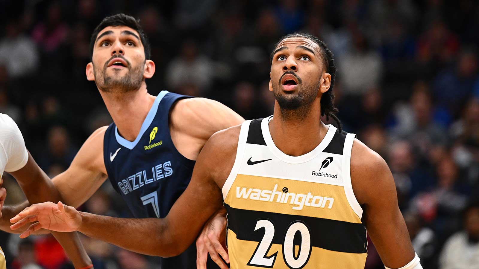 Washington Wizards center Alex Sarr (20) boxes out Memphis Grizzlies forward Santi Aldama (7) during the first half at Capital One Arena. 