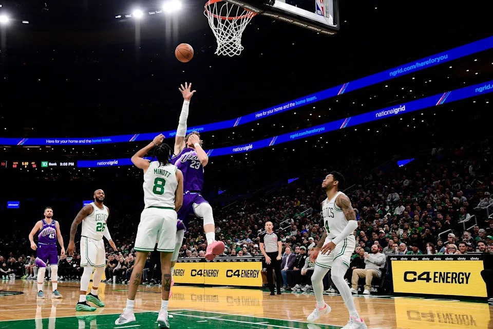 Nov 3, 2025; Boston, Massachusetts, USA; Utah Jazz forward Lauri Markkanen (23) shoots the ball while Boston Celtics forward Josh Minott (8) defends during the second half at TD Garden. Mandatory Credit: Bob DeChiara-Imagn Images