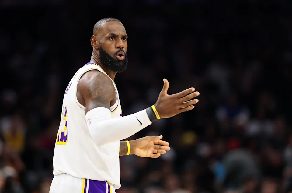 Lebron James #23 of the Los Angeles Lakers reacts during the first half of a game against the Phoenix Suns at Mortgage Matchup Center on Dec. 14, 2025, in Phoenix.