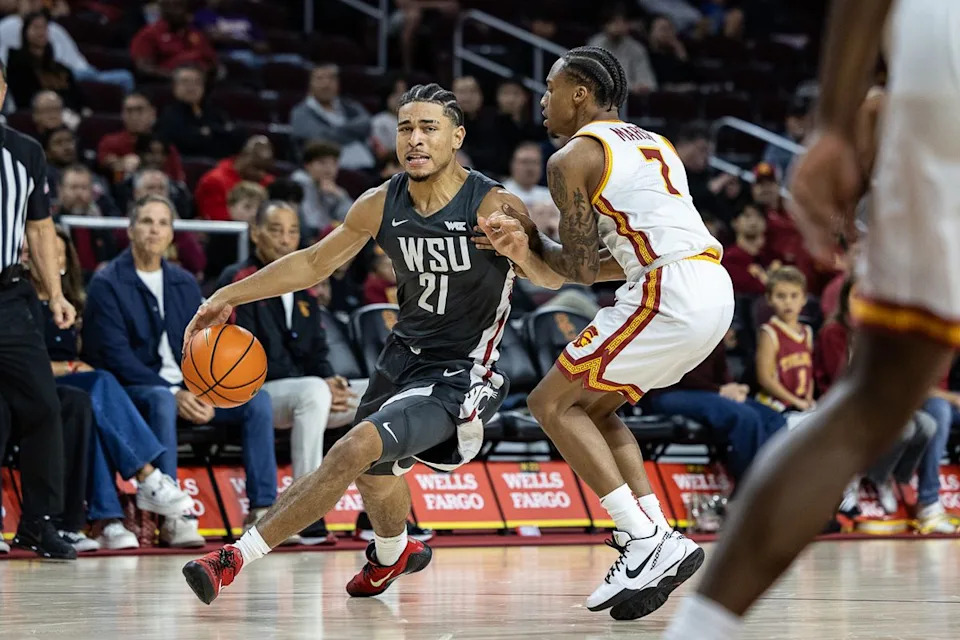 USC guard Jordan Marsh (7) defends during a Big Ten Conference college basketball game against the Washington State Cougars, Sunday December 14, 2025 in Los Angeles, Calif.