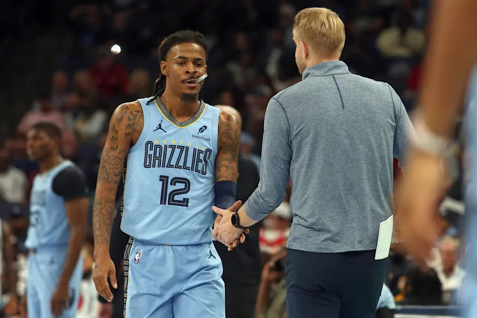 Memphis Grizzlies guard Ja Morant (12) and head coach Tuomas Iisalo.Petre Thomas-Imagn Images