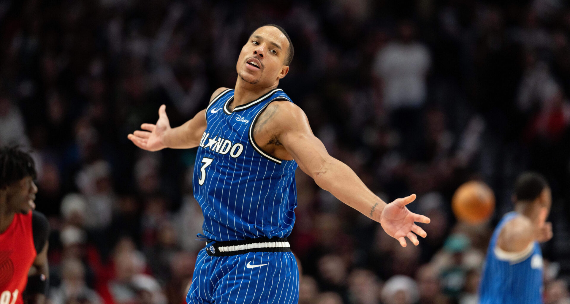 Bane's work on both ends helps Magic hold off Trail Blazers, 110-106