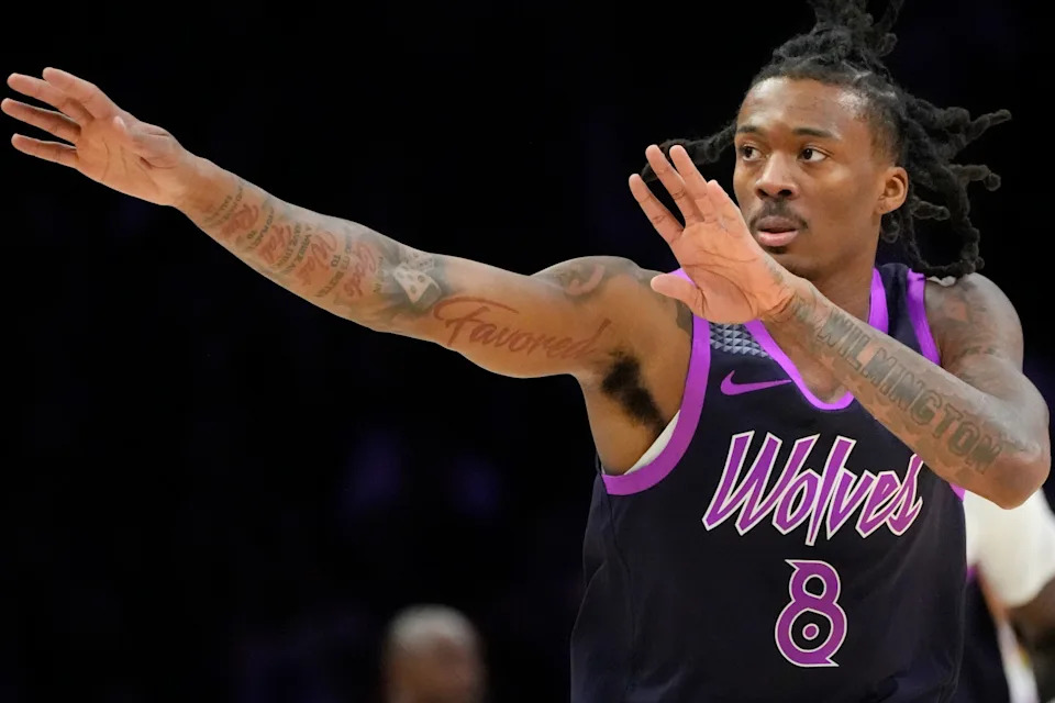 Dec 19, 2025; Minneapolis, Minnesota, USA; Minnesota Timberwolves guard Bones Hyland (8) celebrates his three-point basket against the Oklahoma City Thunder in the first quarter at Target Center. Mandatory Credit: Bruce Kluckhohn-Imagn Images