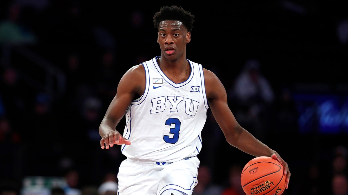 AJ Dybantsa dribbles