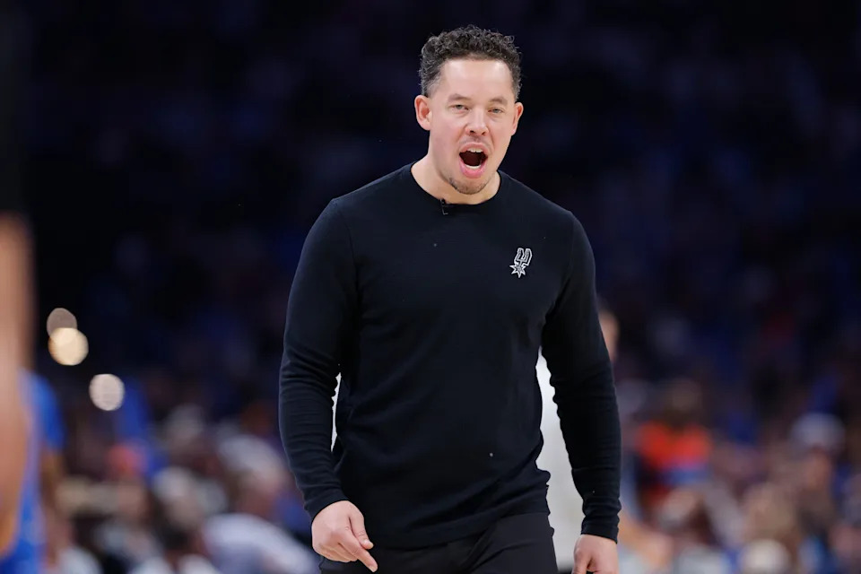 Dec 25, 2025; Oklahoma City, Oklahoma, USA; San Antonio Spurs head coach Mitch Johnson screams during a time out against the Oklahoma City Thunder during the second half at Paycom Center. Mandatory Credit: Alonzo Adams-Imagn Images