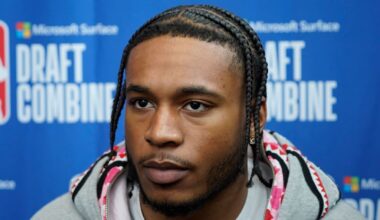 Cam Whitmore looking on