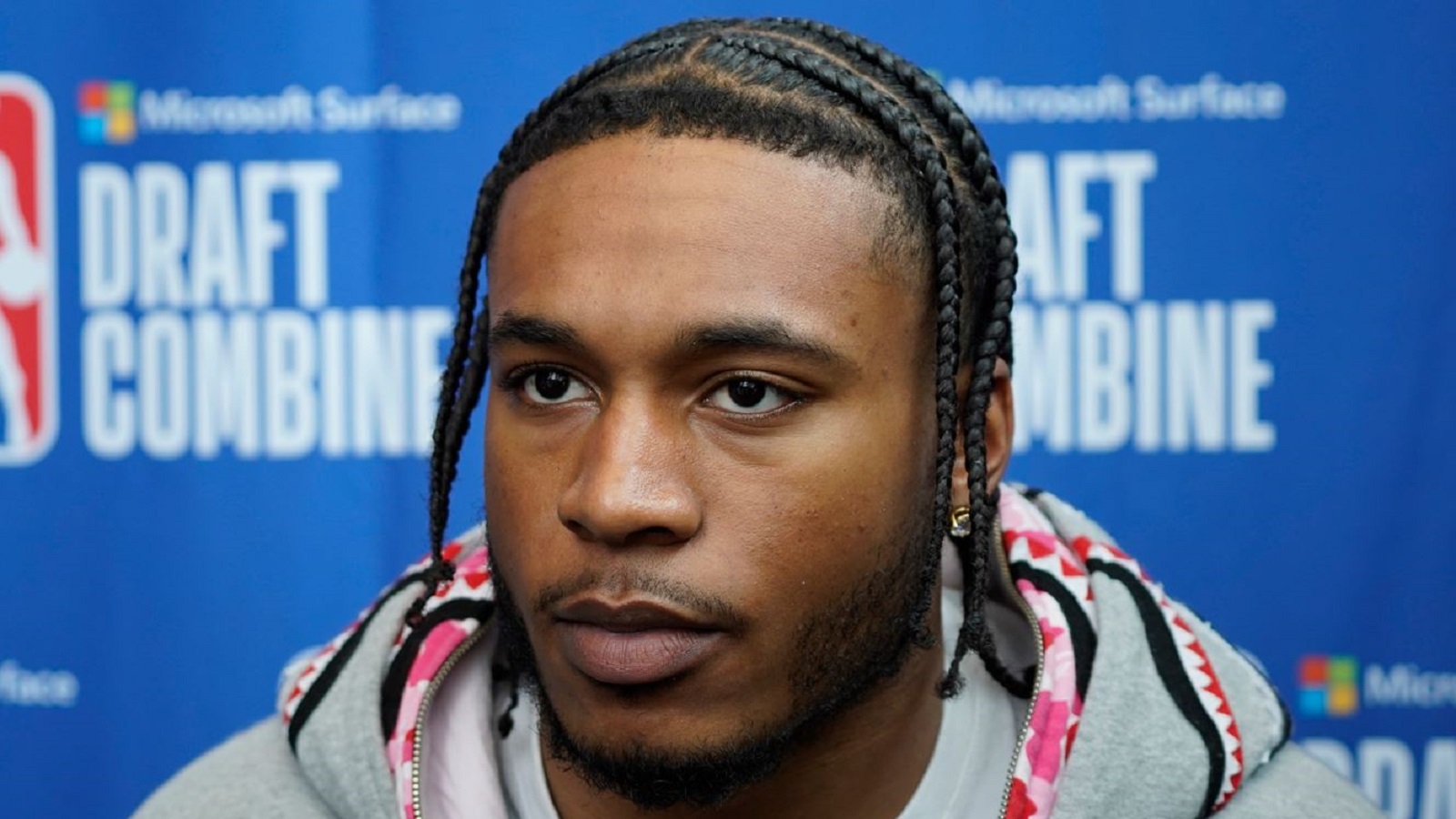 Cam Whitmore looking on