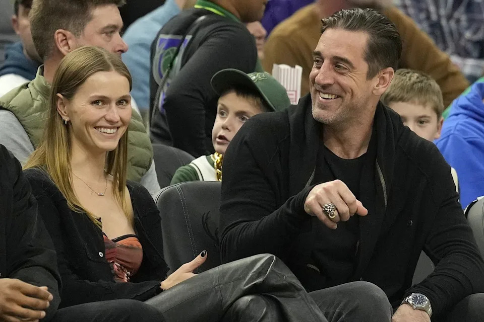 Patrick McDermott/Getty Mallory Edens and Aaron Rodgers at a Bucks game in 2022