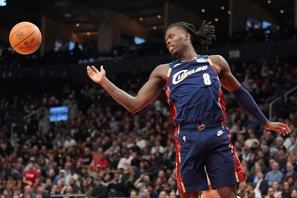 Cleveland Cavaliers forward Chris Livingston reaches for a rebound against the Toronto Raptors on Nov. 24, 2025, in Toronto, Ontario.