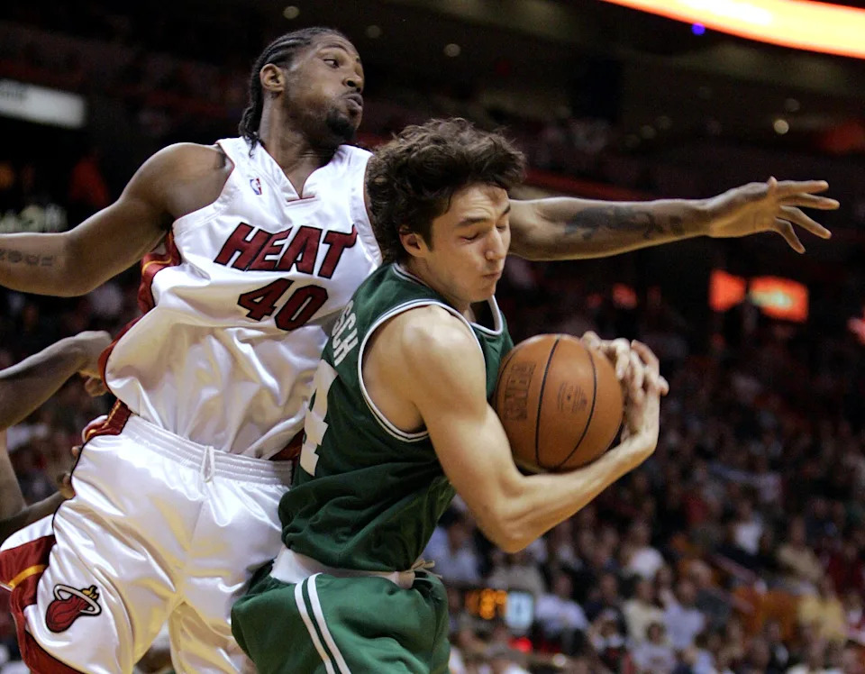 MIAMI - DECEMBER 21: Udonis Haslem #40 of the Miami Heat blocks Jiri Welsch #44 of the Boston Celtics on December 21, 2004 at the American Airlines Arena in Miami, Florida. The Heat defeated the Celtics 108-100. NOTE TO USER: User expressly acknowledges and agrees that, by downloading and or using this photograph, User is consenting to the terms and conditions of the Getty Images License Agreement. (Photo by Eliot J. Schechter/Getty Images)