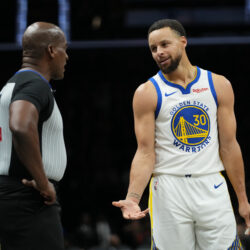Golden State Warriors' Stephen Curry (30) argues a call with an official during the second half of an NBA basketball game against the Brooklyn Nets Monday, Dec. 29, 2025, in New York. (AP Photo/Frank Franklin II)