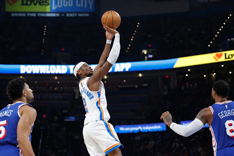 Dec 28, 2025; Oklahoma City, Oklahoma, USA; Oklahoma City Thunder guard Shai Gilgeous-Alexander (2) shoots a three point basket against the Philadelphia 76ers during the second half at Paycom Center. Mandatory Credit: Alonzo Adams-Imagn Images