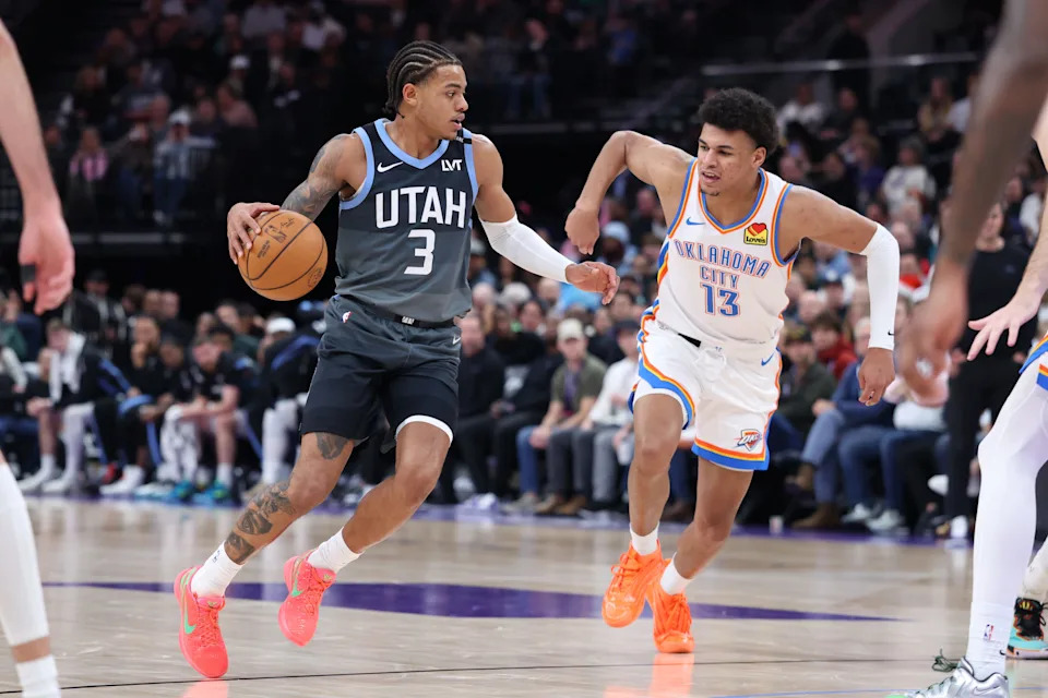 Dec 7, 2025; Salt Lake City, Utah, USA; Utah Jazz guard Keyonte George (3) moves the ball as Oklahoma City Thunder forward Ousmane Dieng (13) defends during the second half at Delta Center. Mandatory Credit: Rob Gray-Imagn Images