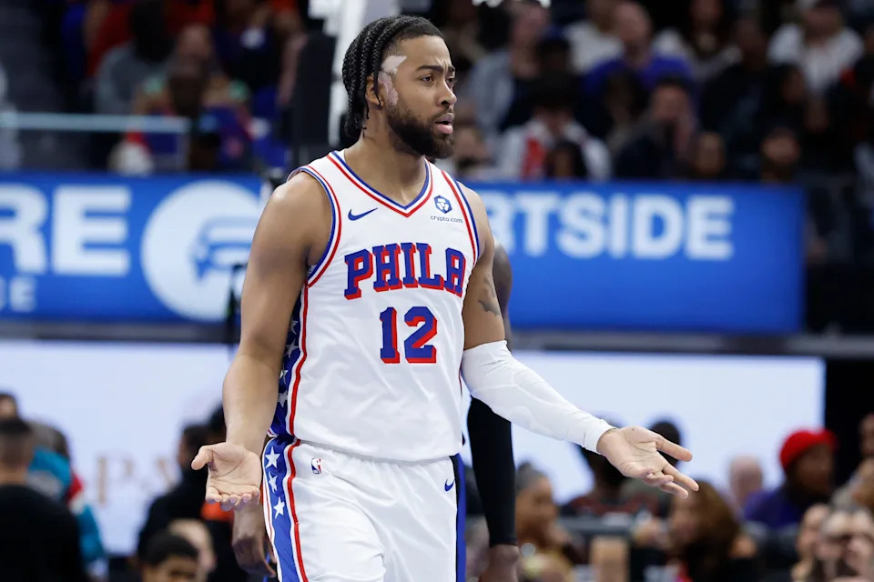 Nov 14, 2025; Detroit, Michigan, USA; Philadelphia 76ers forward Trendon Watford (12) reacts in the second half against the Detroit Pistons at Little Caesars Arena. Mandatory Credit: Rick Osentoski-Imagn Images