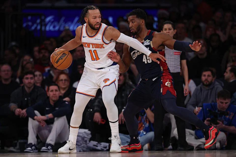 New York Knicks guard Jalen Brunson is guarded by Cleveland Cavaliers guard Donovan Mitchell during the first half at Madison Square Garden, Dec. 25, 2025.