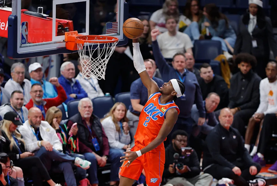 Dec 10, 2025; Oklahoma City, Oklahoma, USA; Oklahoma City Thunder guard Shai Gilgeous-Alexander (2) goes up for a basket against the Phoenix Suns during the third quarter at Paycom Center. Mandatory Credit: Alonzo Adams-Imagn Images