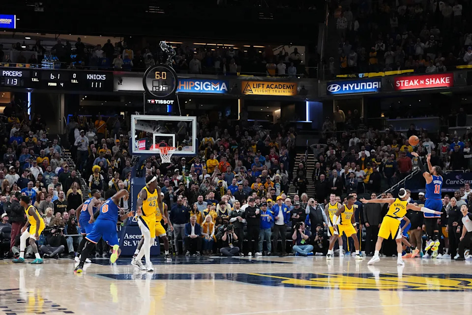 Jalen Brunson takes the game-winning 3-point shot over Pacers guard Andrew Nembhard. (Photo by Dylan Buell/Getty Images)