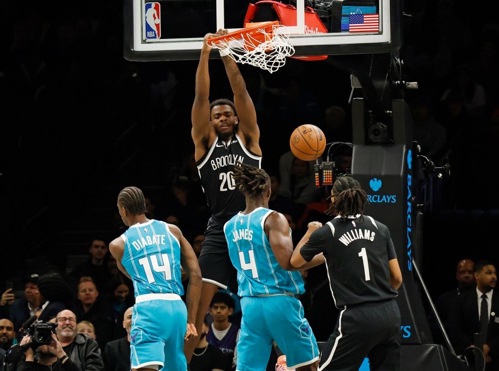 Brooklyn Nets center Day'Ron Sharpe (20) dunks during the game against the Charlotte Hornets.