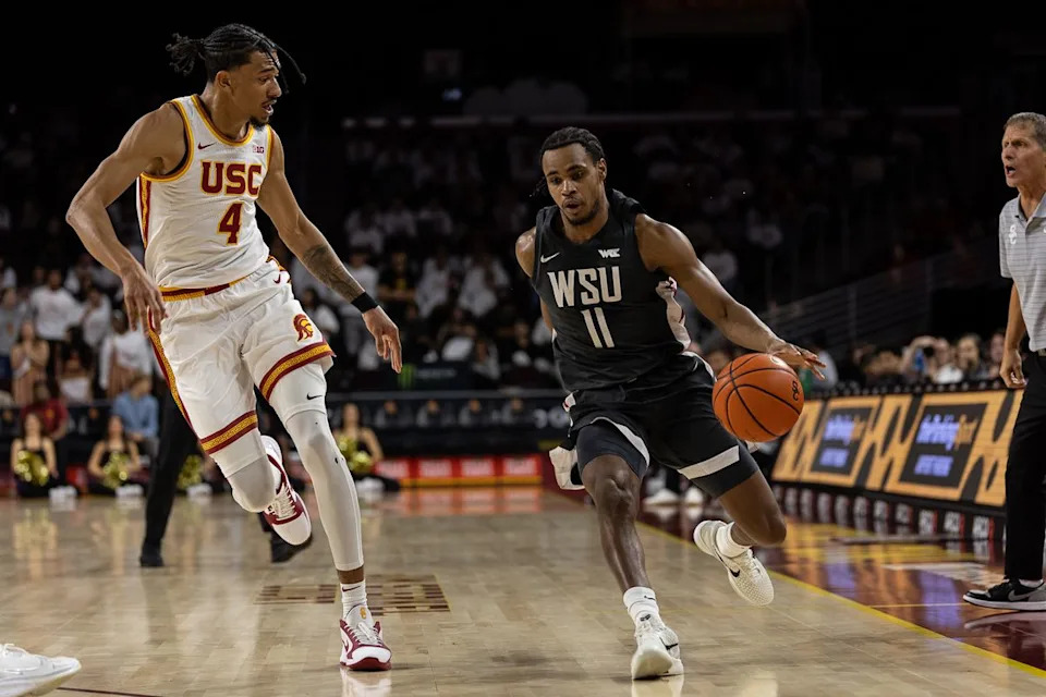 USC guard Chad Baker-Mazara (4) defends during a Big Ten Conference college basketball game against the Washington State Cougars, Sunday December 14, 2025 in Los Angeles, Calif.