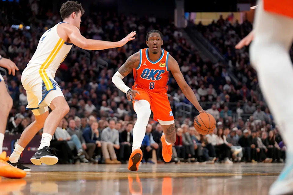 Dec 2, 2025; San Francisco, California, USA; Oklahoma City Thunder guard Jalen Williams (8) dribbles the ball next to Golden State Warriors center Quinten Post (21) in the fourth quarter at the Chase Center. Mandatory Credit: Cary Edmondson-Imagn Images