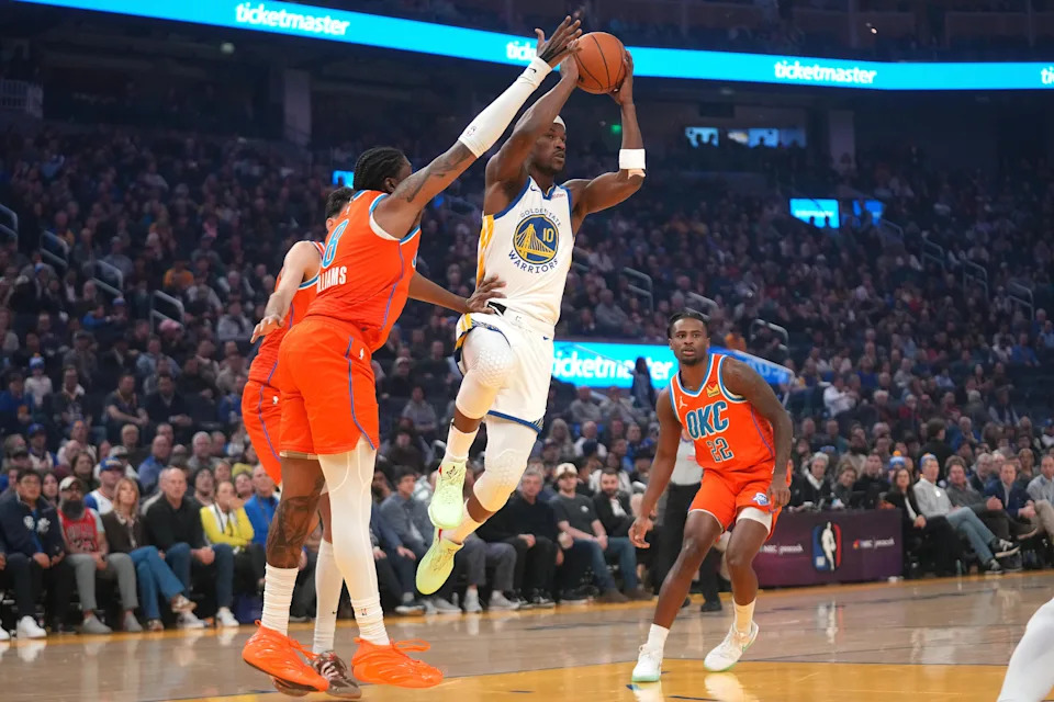 Dec 2, 2025; San Francisco, California, USA; Golden State Warriors forward Jimmy Butler III (10) looks to pass the ball away from the reach of Oklahoma City Thunder guard Jalen Williams (8) in the first quarter at the Chase Center. Mandatory Credit: Cary Edmondson-Imagn Images