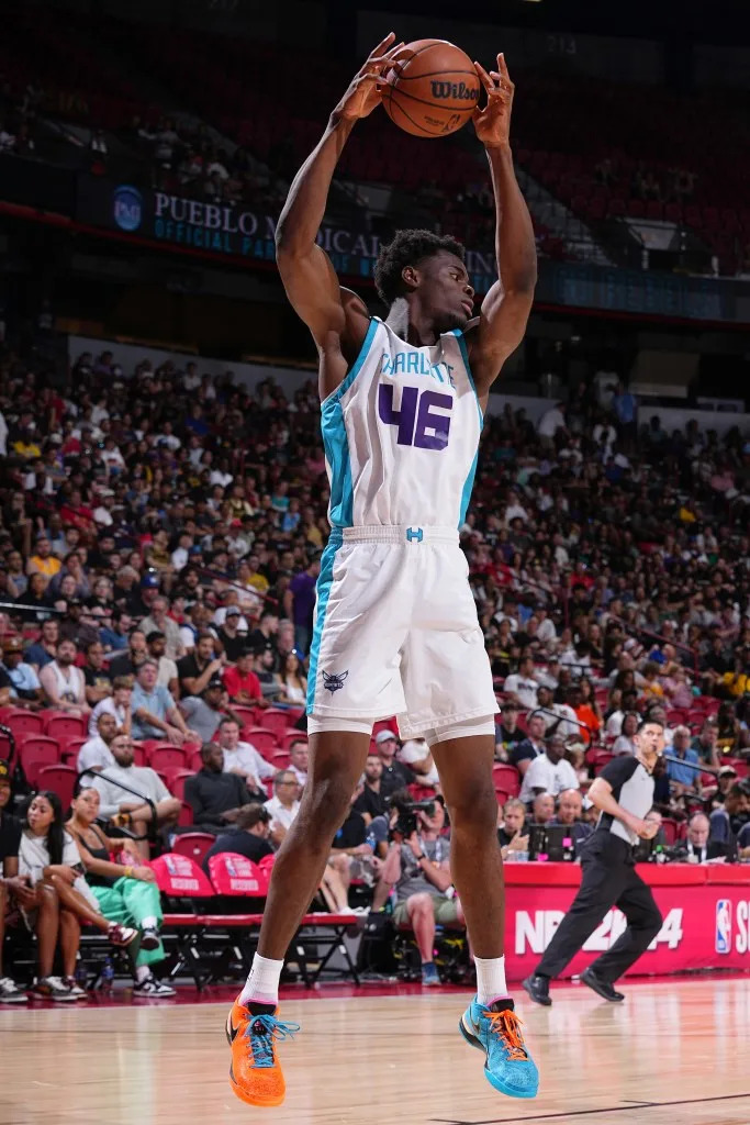 James Nnaji of the Charlotte Hornets rebounds the ball during the game against the Los Angeles Lakers during the 2023 NBA Las Vegas Summer League on July 9, 2023, at the Thomas & Mack Center in Las Vegas, Nevada. NBAE via Getty Images