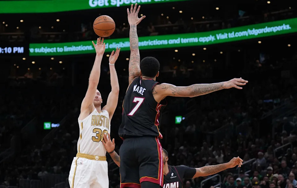Dec 19, 2025; Boston, Massachusetts, USA; Boston Celtics forward Sam Hauser (30) shoots the ball against the Miami Heat in the second half at TD Garden. Mandatory Credit: David Butler II-Imagn Images