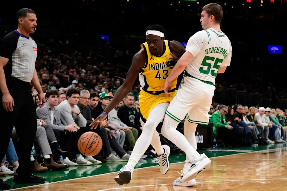 Dec 22, 2025; Boston, Massachusetts, USA; Indiana Pacers forward Pascal Siakam (43) controls the ball while Boston Celtics guard Baylor Scheierman (55) defends during the second half at TD Garden. Mandatory Credit: Bob DeChiara-Imagn Images