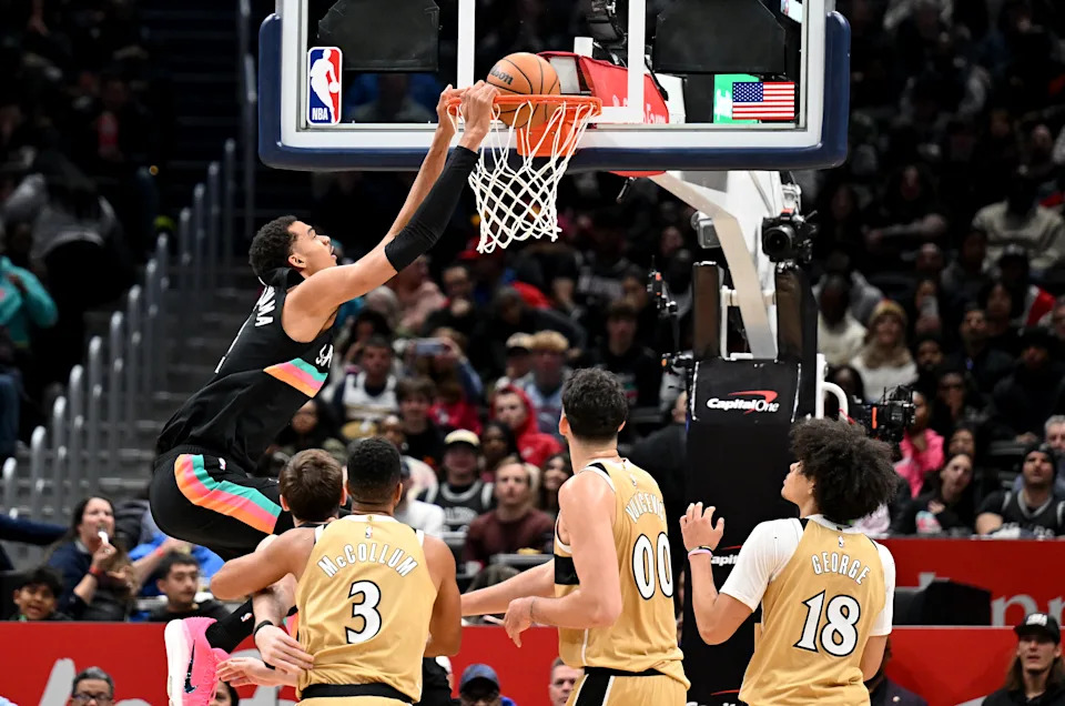 WASHINGTON, DC - DECEMBER 21: Victor Wembanyama #1 of the San Antonio Spurs dunks the ball in the second quarter against Tristan Vukcevic #00 of the Washington Wizards at Capital One Arena on December 21, 2025 in Washington, DC. NOTE TO USER: User expressly acknowledges and agrees that, by downloading and or using this photograph, User is consenting to the terms and conditions of the Getty Images License Agreement. (Photo by Greg Fiume/Getty Images)