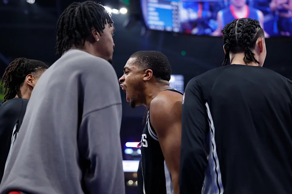 Dec 25, 2025; Oklahoma City, Oklahoma, USA; San Antonio Spurs guard De'Aaron Fox (4) celebrates during a time out against the Oklahoma City Thunder during the second half at Paycom Center. Mandatory Credit: Alonzo Adams-Imagn Images