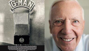 Gary Gerould smiling next to a microphone with a metal G-Man inscribed on top