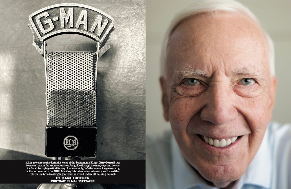 Gary Gerould smiling next to a microphone with a metal G-Man inscribed on top