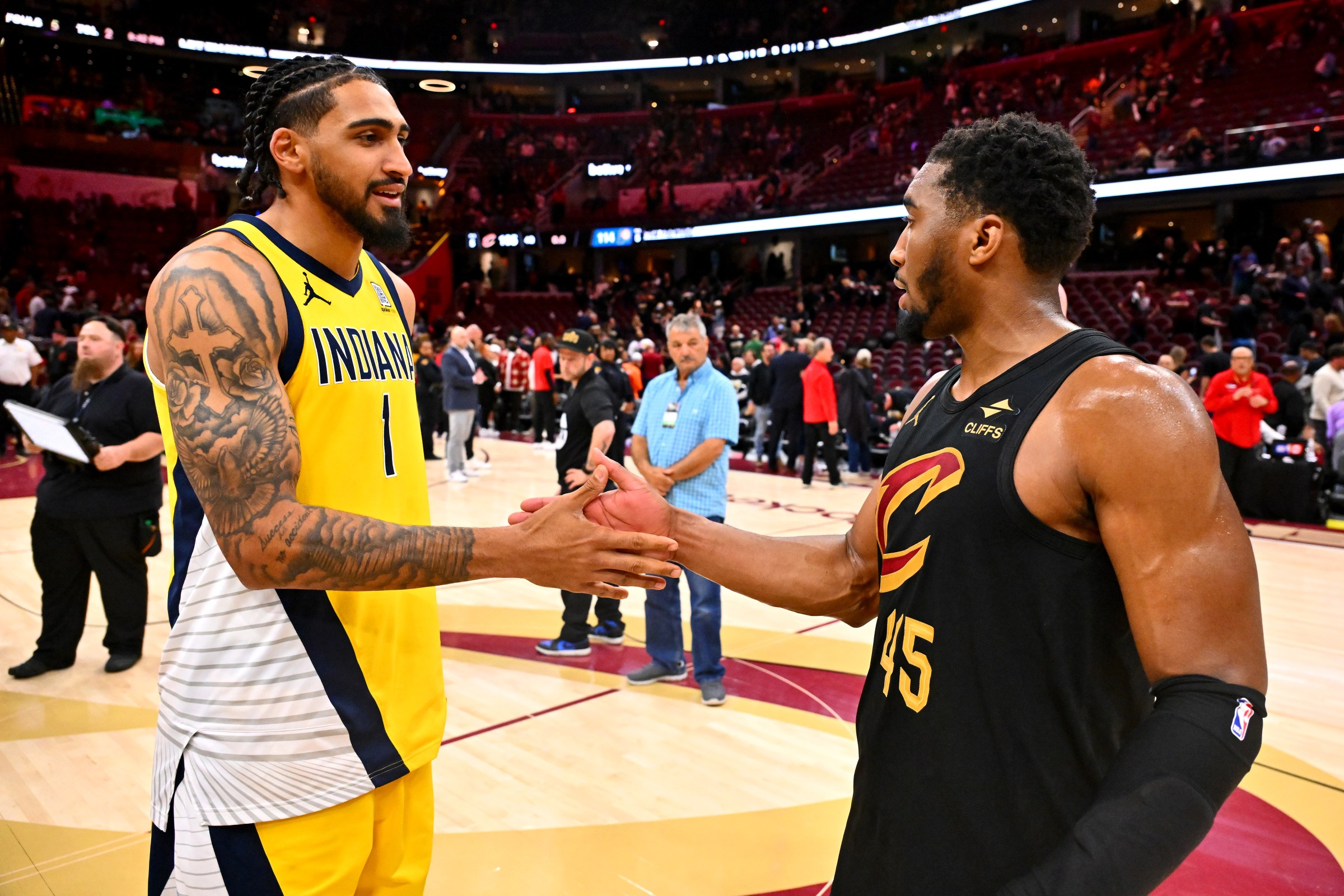 CLEVELAND, OHIO - MAY 13: Obi Toppin #1 of the Indiana Pacers greets Donovan Mitchell #45 of the Cleveland Cavaliers following Game Five of the Eastern Conference Second Round NBA Playoffs at Rocket Arena on May 13, 2025 in Cleveland, Ohio. NOTE TO USER: User expressly acknowledges and agrees that, by downloading and or using this photograph, User is consenting to the terms and conditions of the Getty Images License Agreement. Indiana defeated Cleveland 114-105. (Photo by Jason Miller/Getty Images)