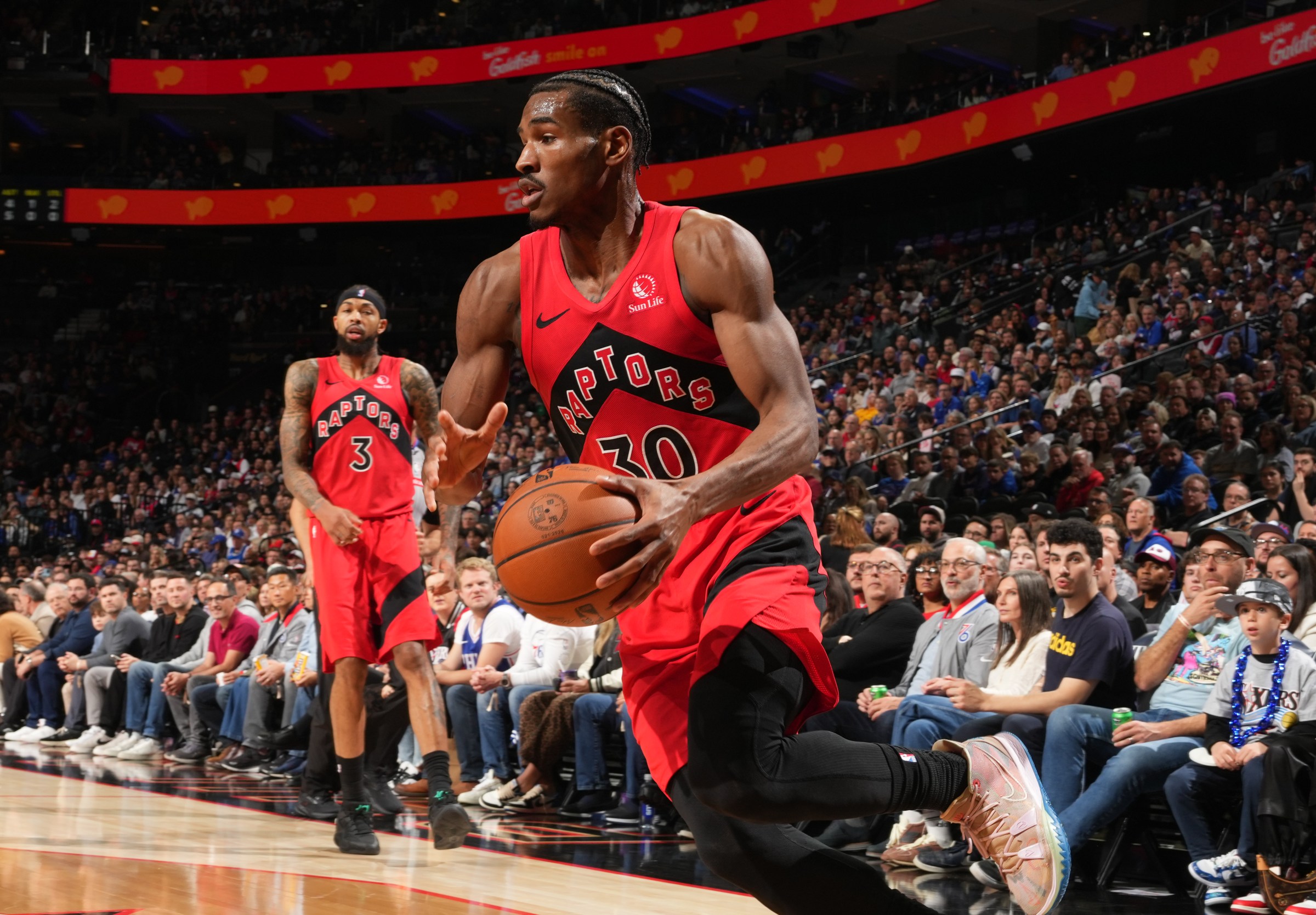 PHILADELPHIA, PA - NOVEMBER 8: Ochai Agbaji #30 of the Toronto Raptors dribbles the ball during the game against the Philadelphia 76ers on November 8, 2025 at the Wells Fargo Center in Philadelphia, Pennsylvania NOTE TO USER: User expressly acknowledges and agrees that, by downloading and/or using this Photograph, user is consenting to the terms and conditions of the Getty Images License Agreement. Mandatory Copyright Notice: Copyright 2025 NBAE (Photo by Jesse D. Garrabrant/NBAE via Getty Images)