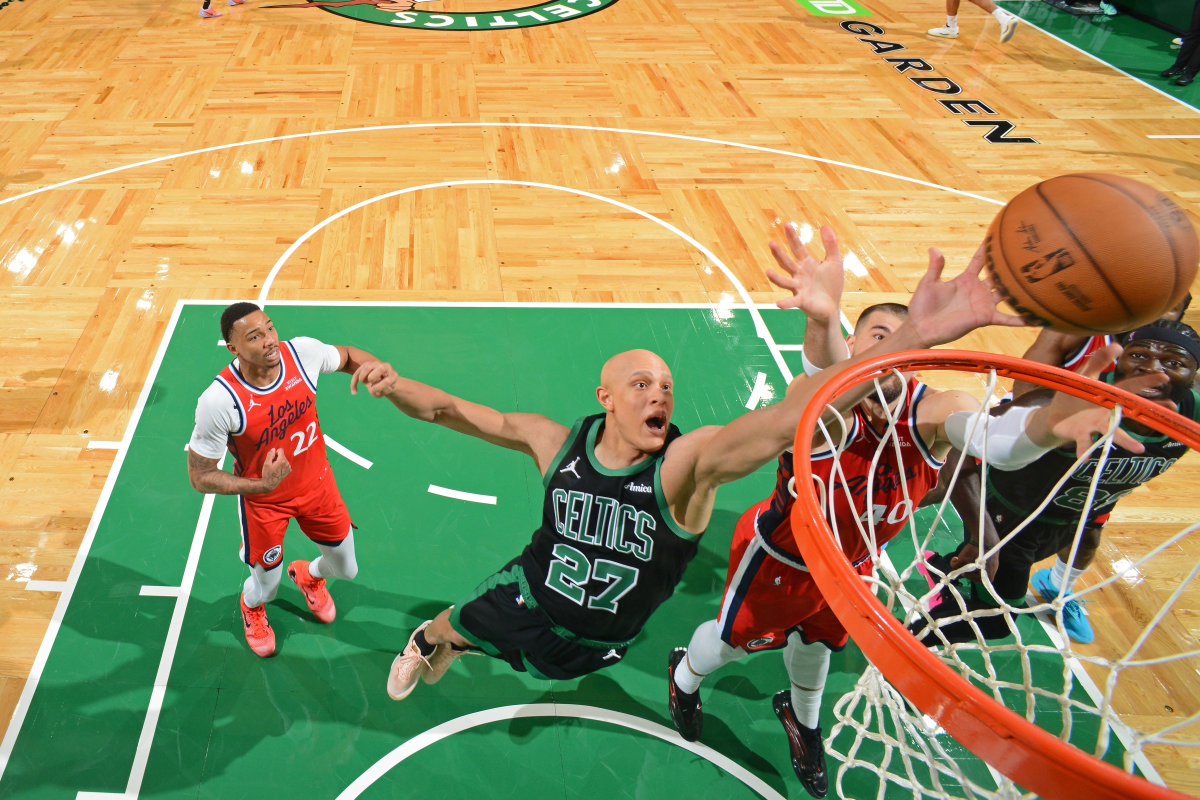BOSTON, MA - NOVEMBER 16: Jordan Walsh #27 of the Boston Celtics grabs the rebound during the game against the LA Clippers on November 16, 2025 at TD Garden in Boston, Massachusetts. NOTE TO USER: User expressly acknowledges and agrees that, by downloading and/or using this Photograph, user is consenting to the terms and conditions of the Getty Images License Agreement. Mandatory Copyright Notice: Copyright 2025 NBAE (Photo by Brian Babineau/NBAE via Getty Images)