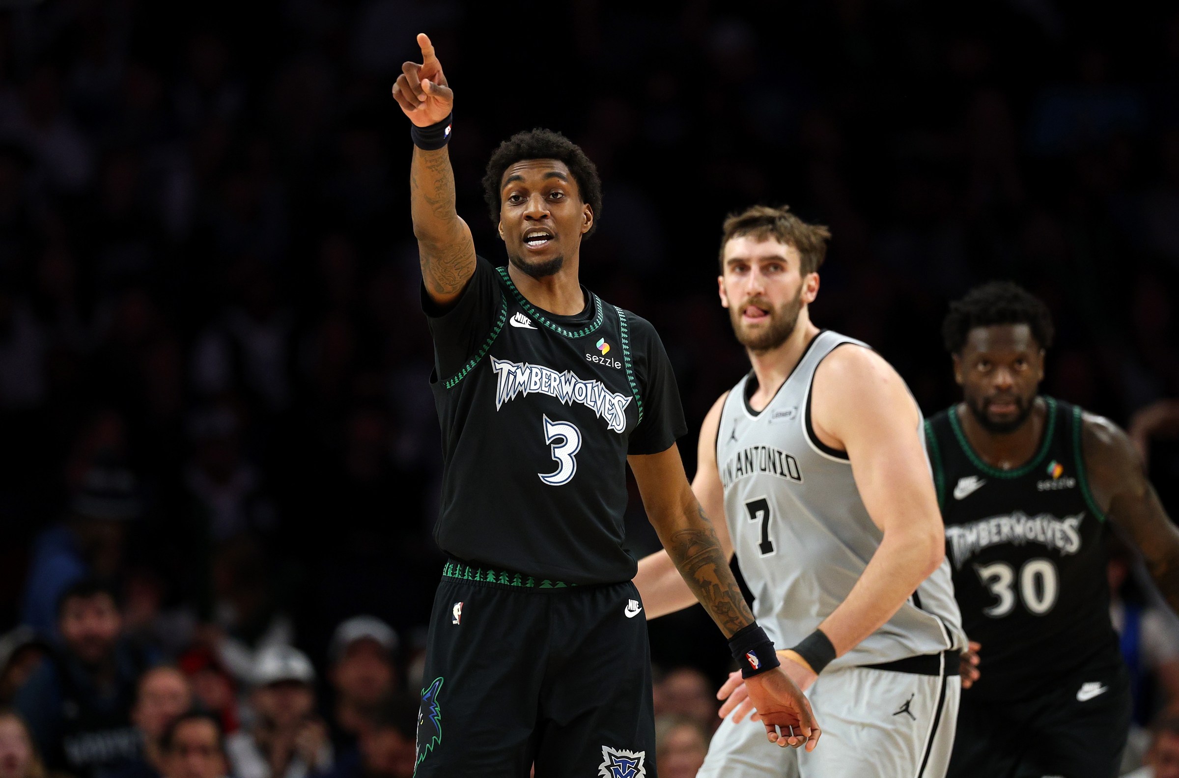 MINNEAPOLIS, MINNESOTA - NOVEMBER 30: Jaden McDaniels #3 of the Minnesota Timberwolves reacts against the San Antonio Spurs in the fourth quarter at Target Center on November 30, 2025 in Minneapolis, Minnesota. The Timberwolves defeated the Spurs 125-112. NOTE TO USER: User expressly acknowledges and agrees that, by downloading and or using this photograph, User is consenting to the terms and conditions of the Getty Images License Agreement. (Photo by David Berding/Getty Images)