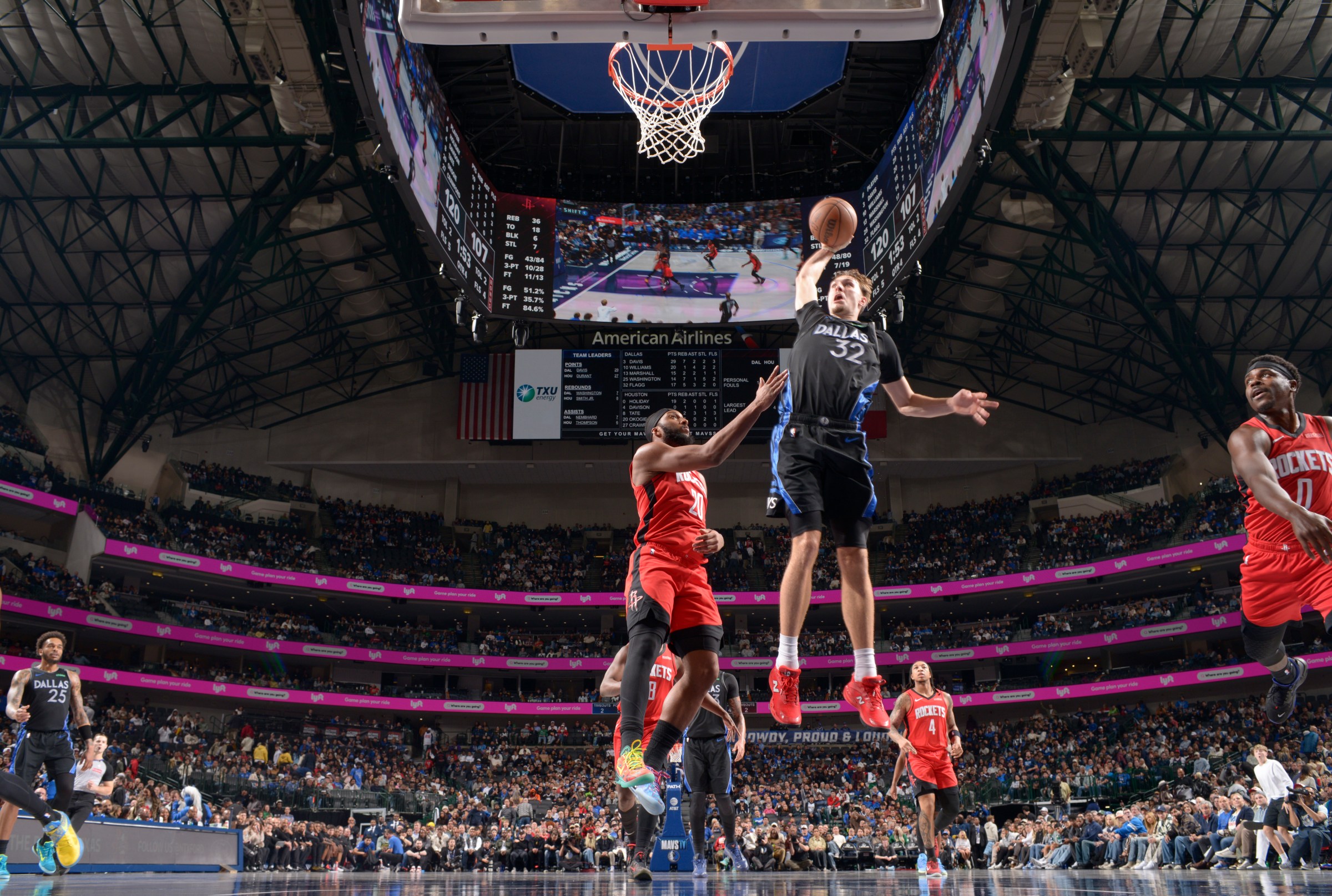 DALLAS, TX - DECEMBER 6: Cooper Flagg #32 of the Dallas Mavericks dunks the ball during the game against the Houston Rockets on December 6, 2025 at American Airlines Center in Dallas, Texas. NOTE TO USER: User expressly acknowledges and agrees that, by downloading and or using this photograph, User is consenting to the terms and conditions of the Getty Images License Agreement. Mandatory Copyright Notice: Copyright 2025 NBAE (Photo by Glenn James/NBAE via Getty Images)