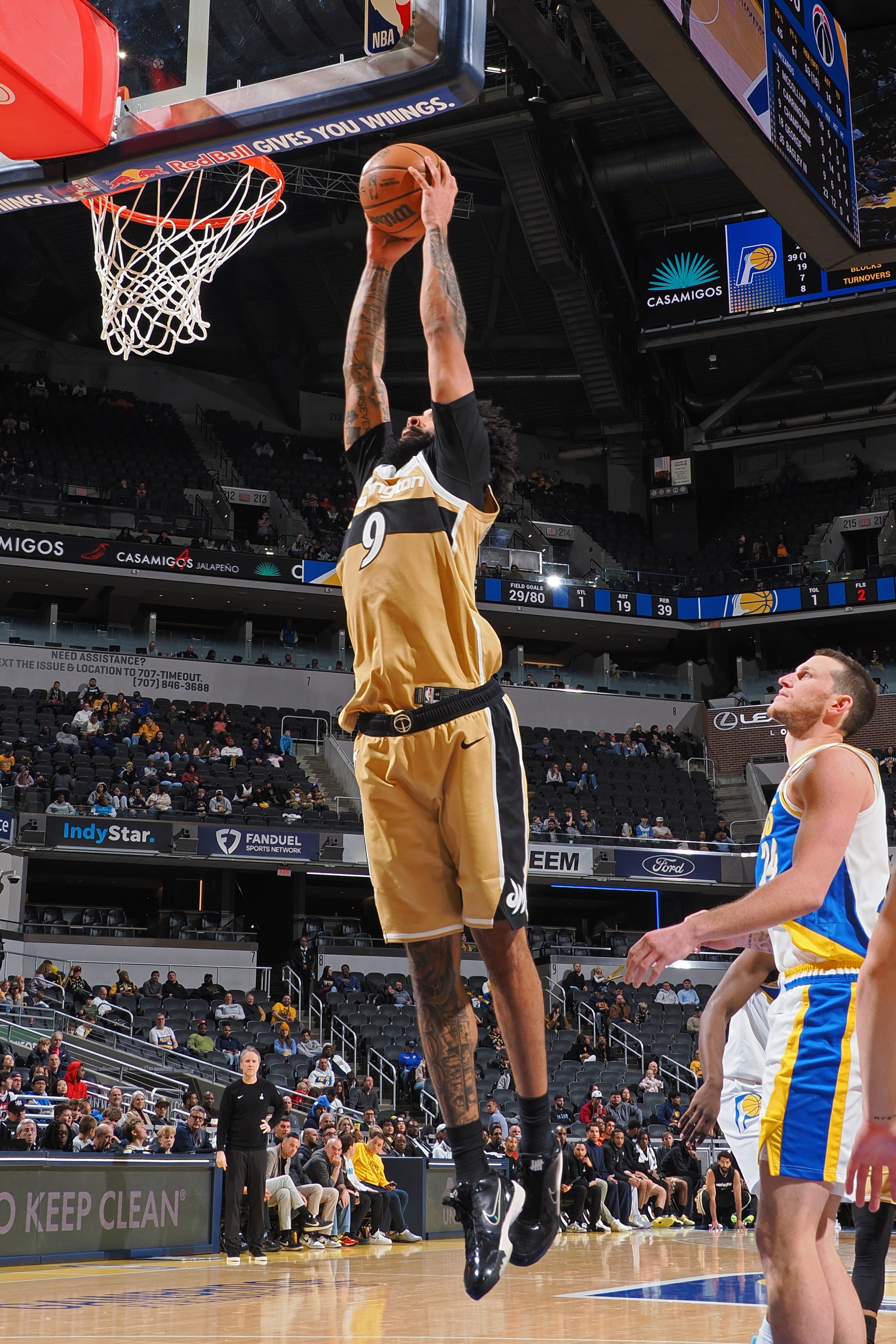 Wizards forward Justin Champagnie gets a dunk against the Indiana Pacers.