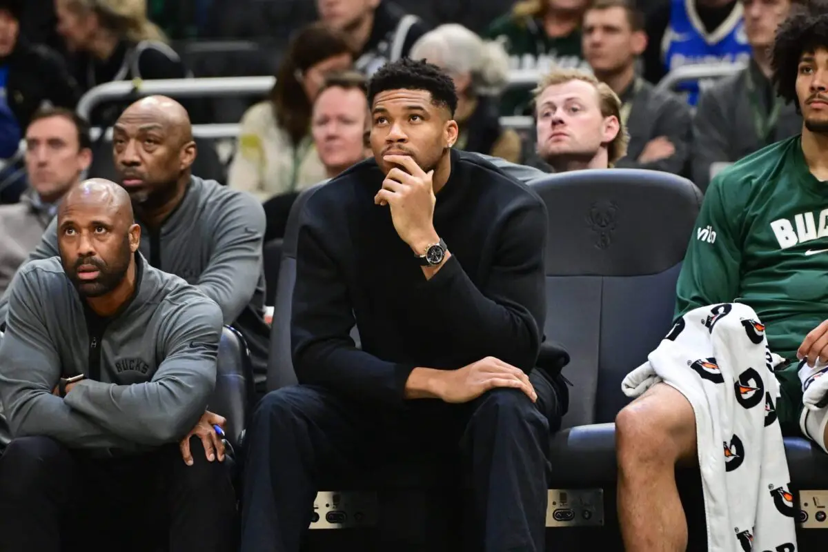 Dec 11, 2025; Milwaukee, Wisconsin, USA; Milwaukee Bucks forward Giannis Antetokounmpo (34) looks on from the bench while recovering from an injury in the second quarter against the Boston Celtics at Fiserv Forum. Mandatory Credit: Benny Sieu-Imagn Images