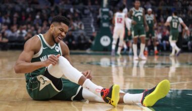 Milwaukee Bucks' Giannis Antetokounmpo reacts after suffering an injury during the first half an NBA basketball game against the Detroit Pistons, Wednesday, Dec. 3, 2025, in Milwaukee.