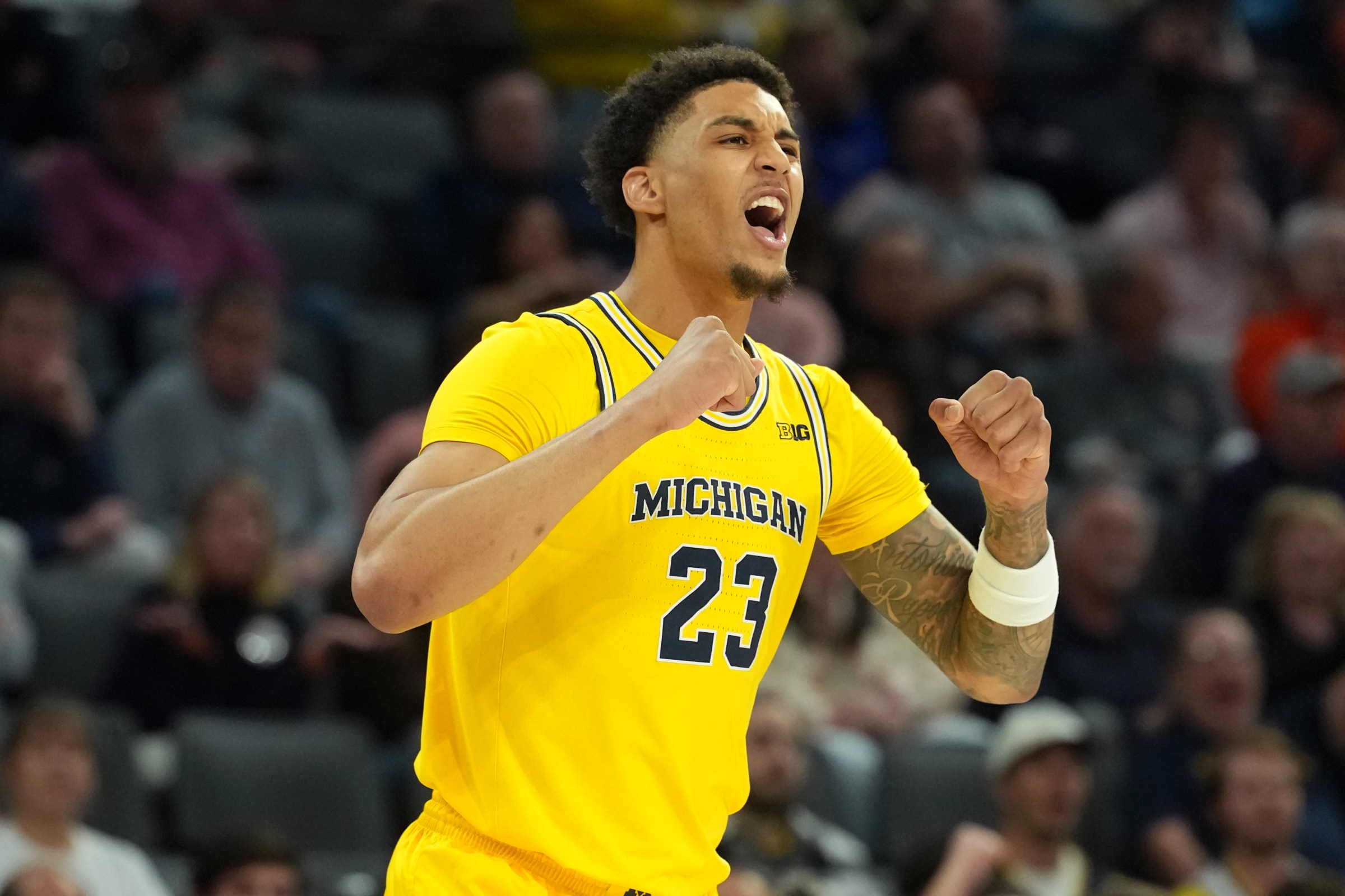 Nov 25, 2025; Las Vegas, NV, USA; Michigan Wolverines forward Yaxel Lendeborg (23) reacts during the first half in a 2025 Players Era Festival group play game against the Auburn Tigers at Michelob ULTRA Arena. Mandatory Credit: Kirby Lee-Imagn Images