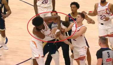 Jose Alvarado and Mark Williams throwing punches at each other