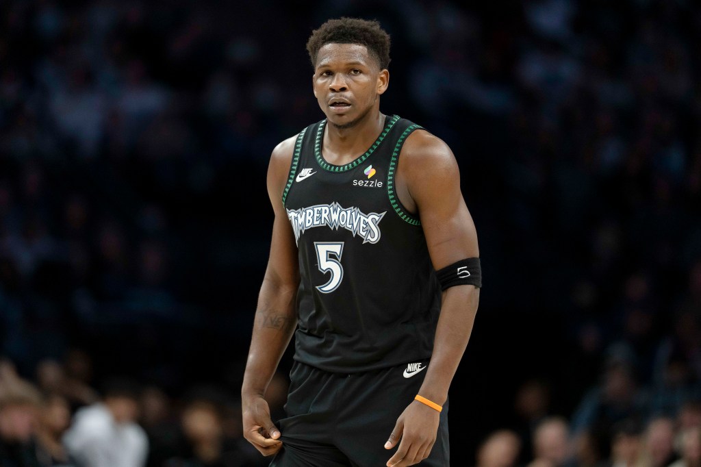 Minnesota Timberwolves guard Anthony Edwards (5) looks on against the New York Knicks.