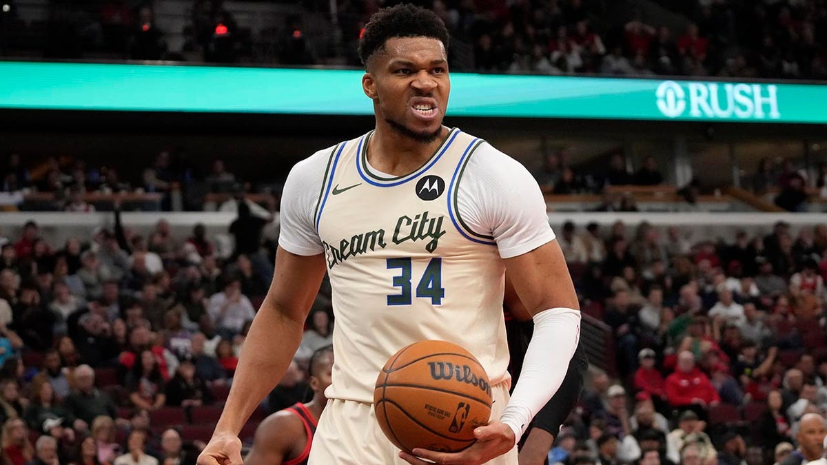 Giannis Antetokounmpo plays to the crowd